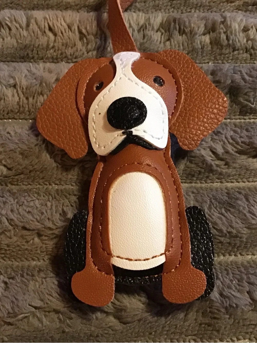 Brown and White Dog-Shaped Pet Tag or Accessory